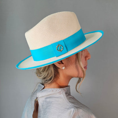 IISA classic Panama hat - sophisticated side profile showcasing handwoven Montecristi craftsmanship and aqua ribbon detail