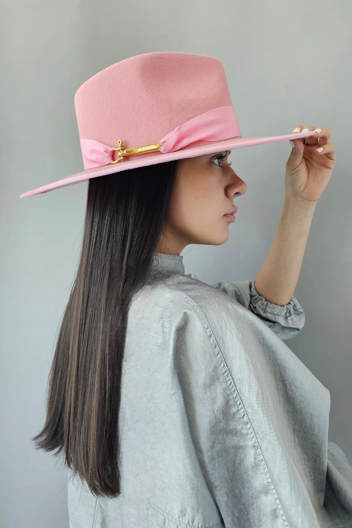 Side profile showing elegant silhouette and craftsmanship