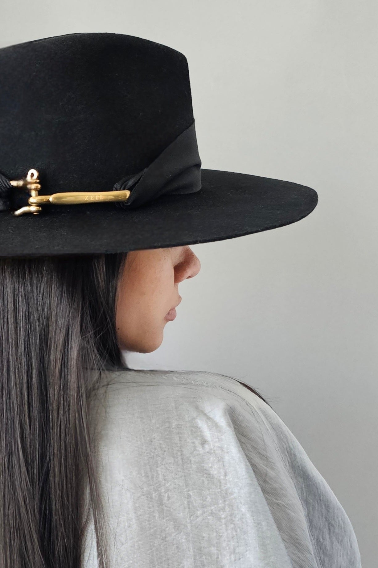 Close-up black wool fedora - luxury Miami-designed signature piece