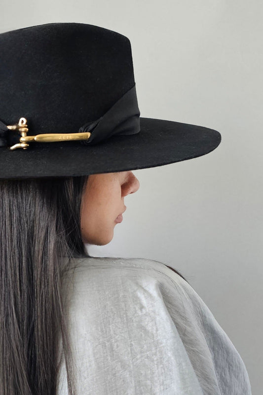 Close-up black wool fedora - luxury Miami-designed signature piece