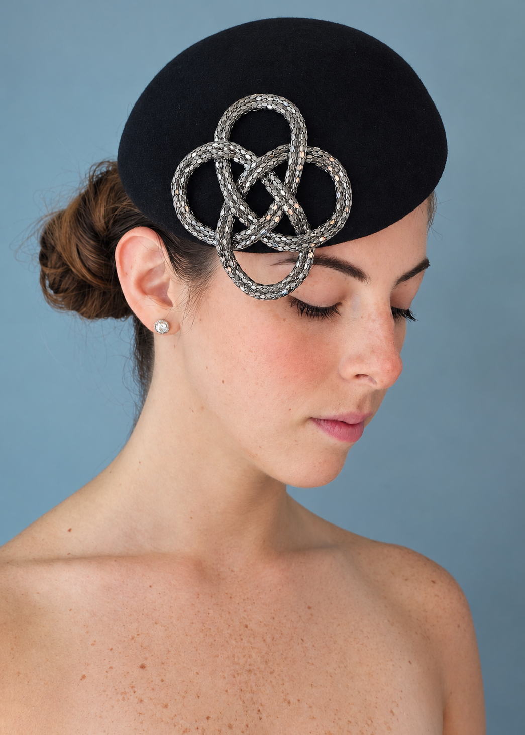 Fleur Percher hat with silver metallic knot embellishment