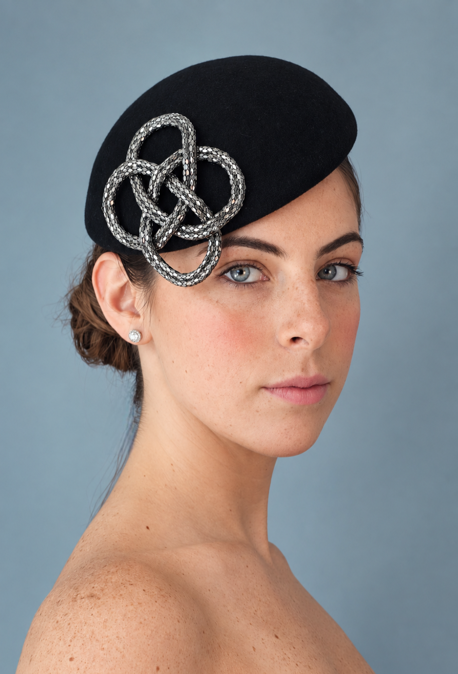 Fleur Percher hat with silver metallic knot embellishment