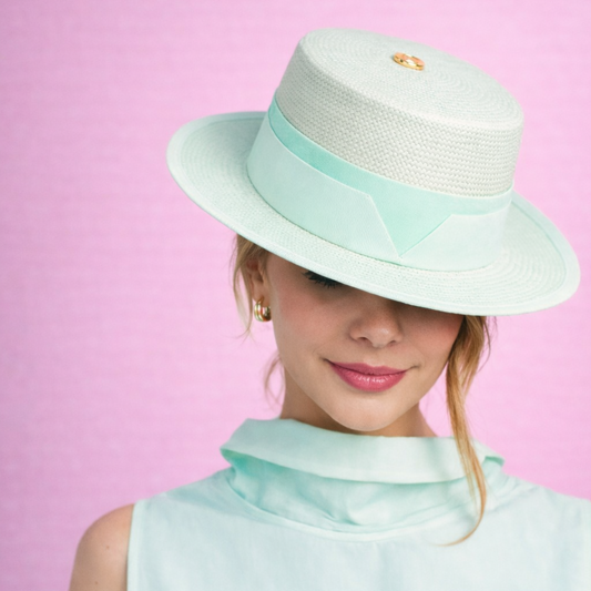 Model in ALMA seafoam green boater hat with white and mint ribbon detail - front view
