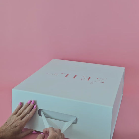 ISA classic Panama hat - dynamic showcase of authentic Montecristi handwoven Toquilla straw featuring aqua ribbon and UNESCO certified artisanal heritage